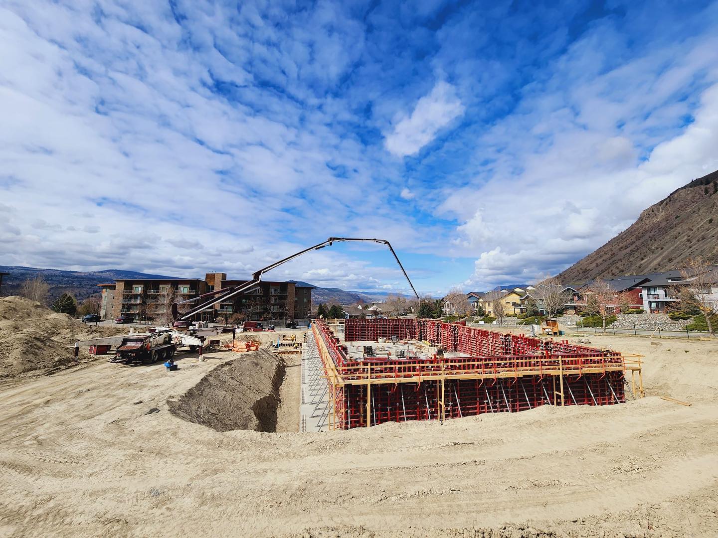 Noremac concrete pumping on a job site.