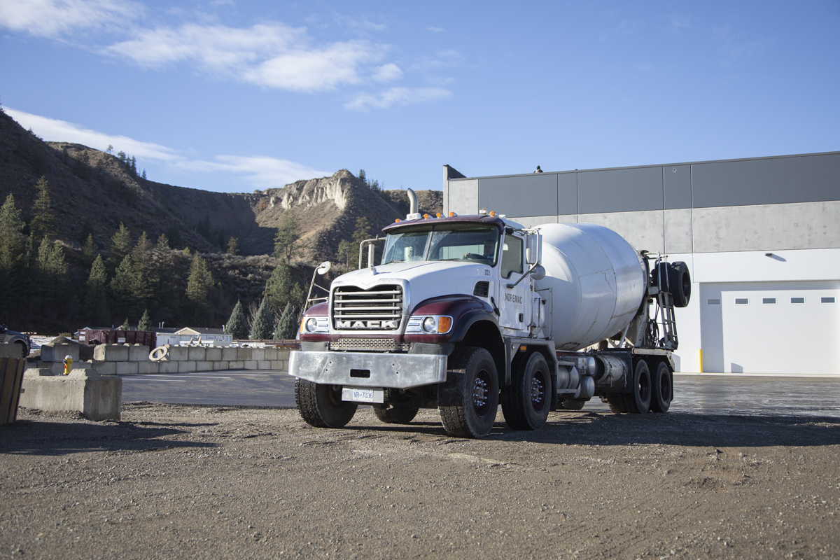 A MACK Noremac concrete pouring truck.