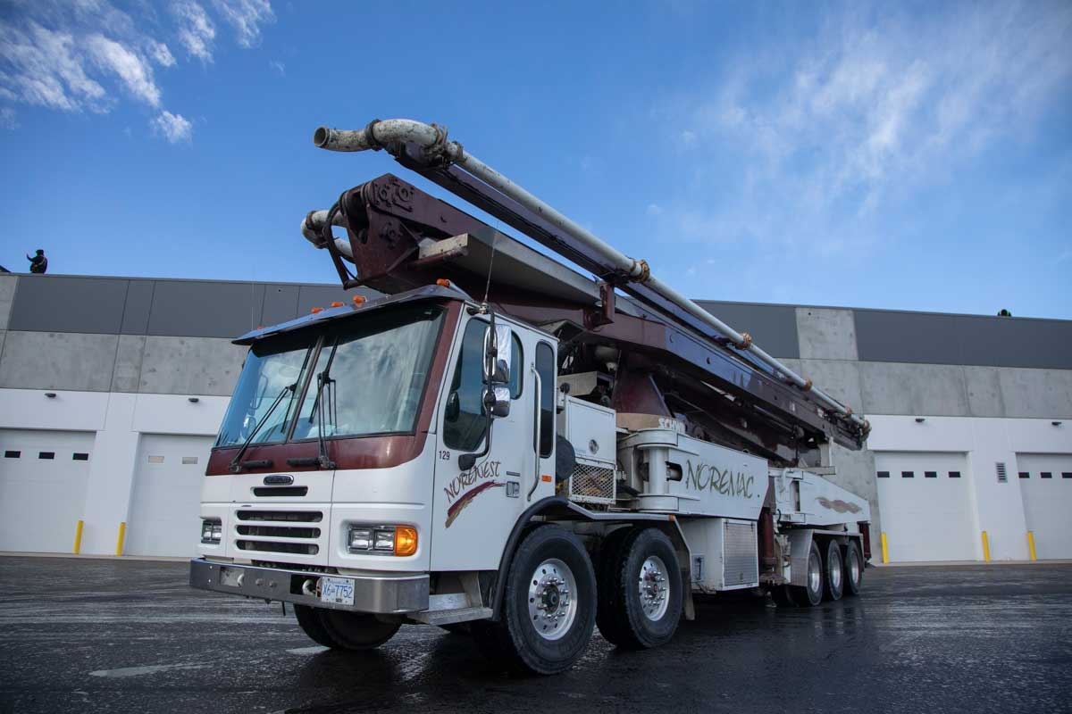 Close up of a Schwing Noremac boom pump.