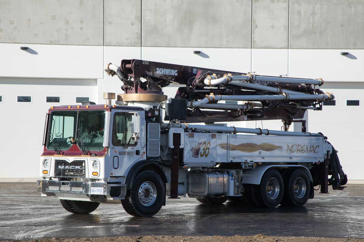 A Schwing 36X Boom with the Noremac logo on it.