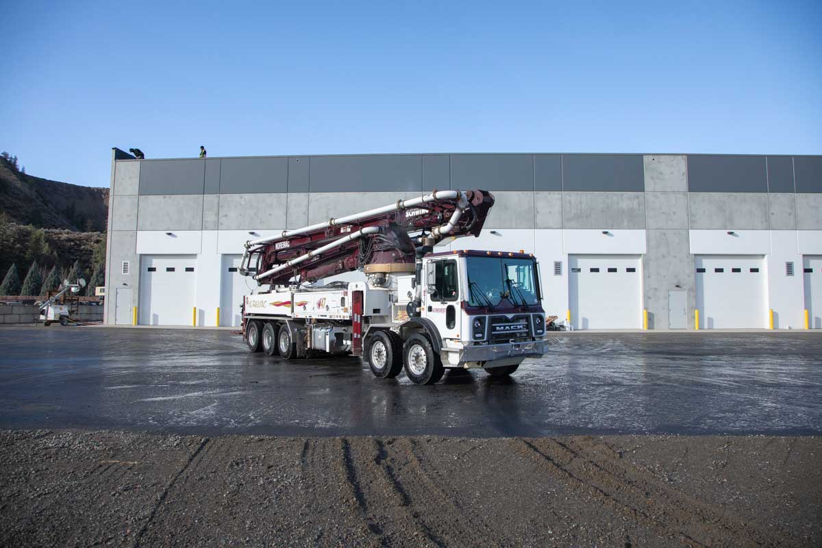 A Schwing 47SX Boom with the Noremac logo on it.