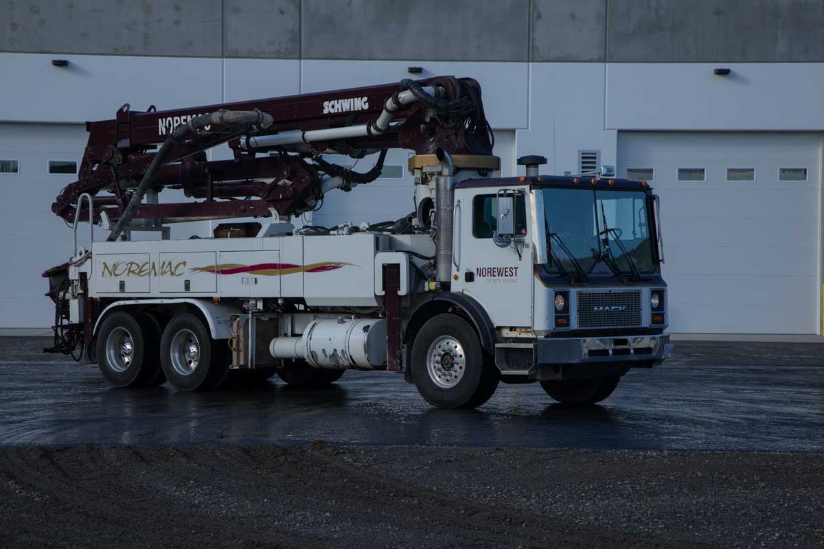 Close up of a Schwing Noremac boom pump.